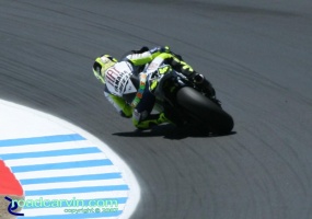 2007 Red Bull U.S. Grand Prix MotoGP - Valentino Rossi (II): Looking good exiting turn 9 in practice.